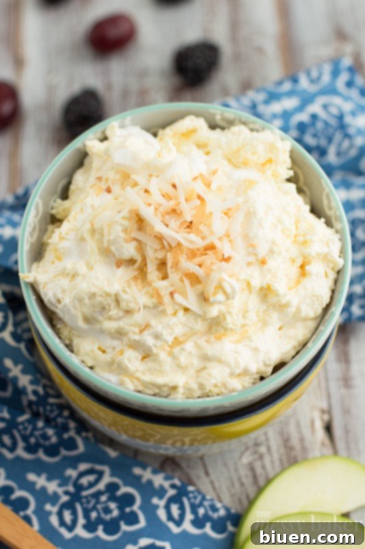 Pina Colada Fruit Dip in a bowl ready to serve