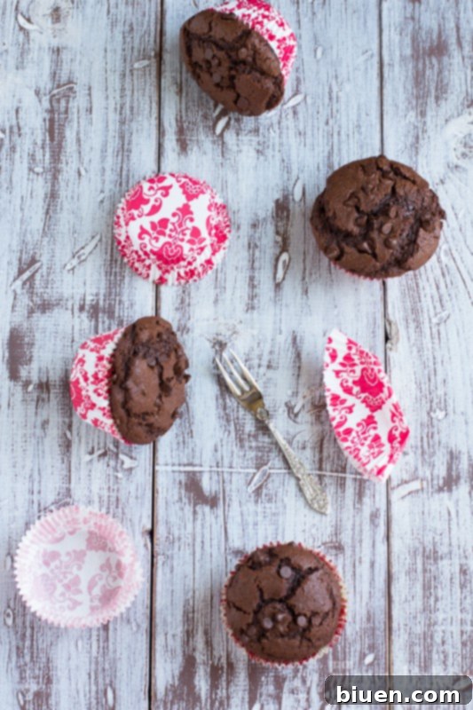 Close-up of a double chocolate chip muffin with melty chocolate inside