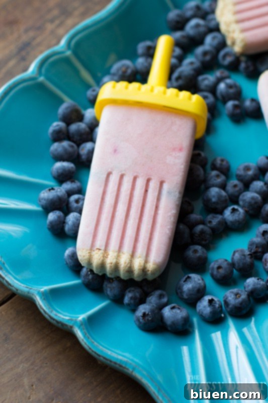 Stack of Healthy Strawberry-Banana Smoothie Popsicles