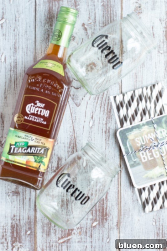 Jose Cuervo Teagarita: Does Tequila and Tea Belong Together 2 Jose Cuervo Teagarita bottle with limes and ice, ready for a summer party