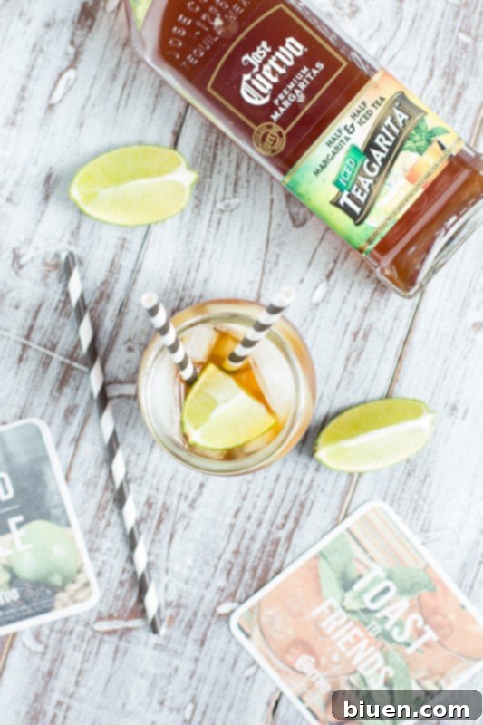 Jose Cuervo Teagarita: Does Tequila and Tea Belong Together 5 Two hands clinking glasses of Jose Cuervo Teagarita, celebrating a summer moment