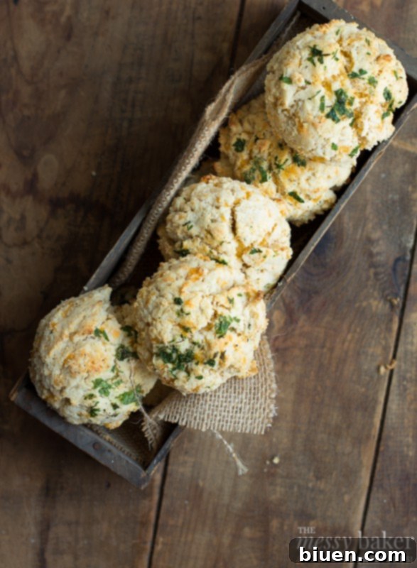 Stacked Gluten-Free Chesapeake Cheddar Bay Biscuits, showing their fluffy texture