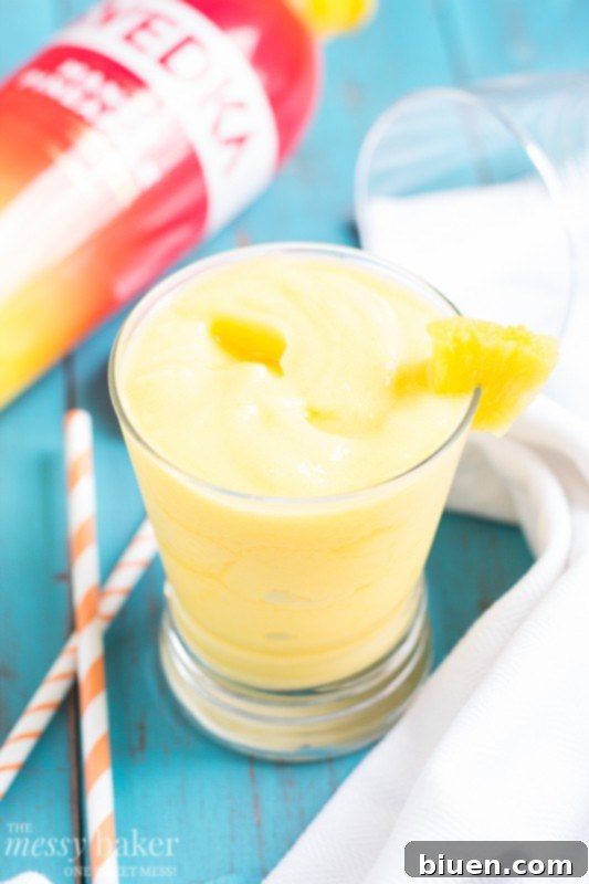Delicious Pineapple Mango Slush Cocktail in a glass