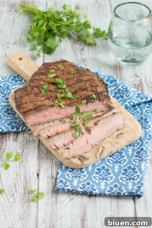 Juicy Grilled Tequila Chipotle Flank Steak, ready to be served.