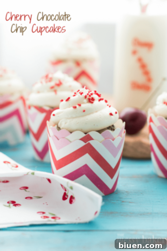 Delicious Cherry Chocolate Chip Cupcakes with smooth Vanilla Bean Buttercream, perfect for summer desserts