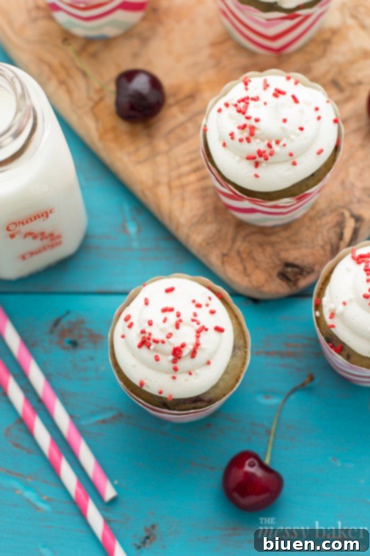 Cherry Chocolate Chip Cupcakes with festive red and white sprinkles, ideal for celebrations