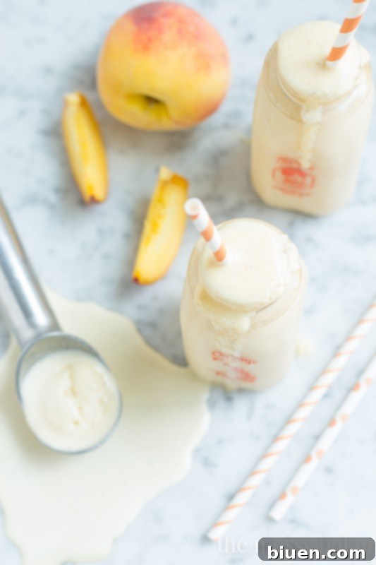 Delicious Peach Pie Milkshake served with whipped cream and cinnamon