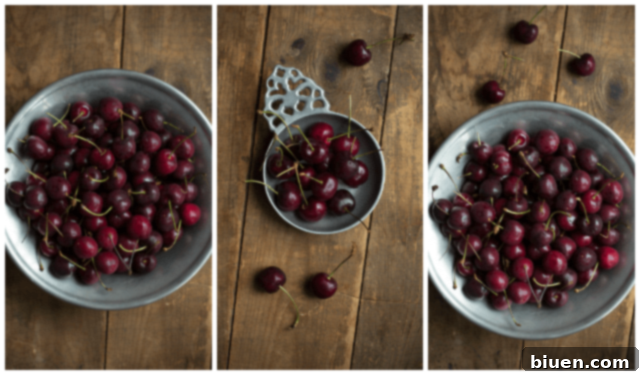 A generous pile of fresh, ripe black cherries, vibrant and ready for preparation.