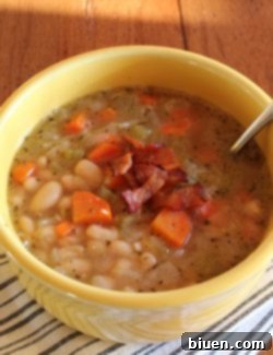 Rustic White Bean Soup with crispy bacon garnish.