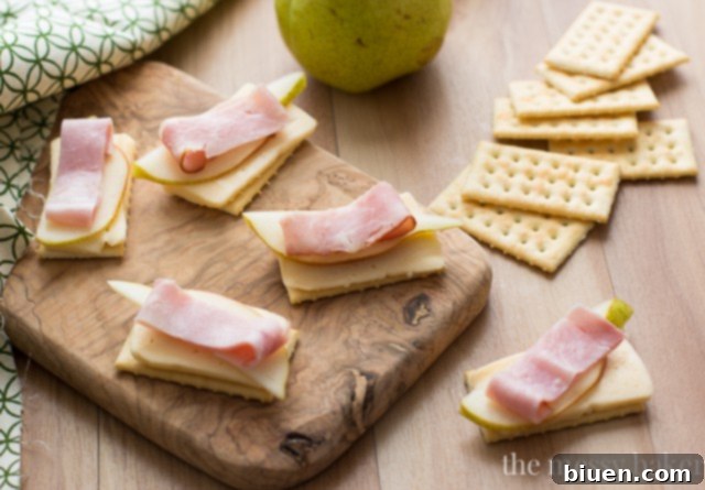 Smoked Ham, Havarti and Pear Crackers 5 Boar's Head Cream Havarti Cheese with pear and smoked ham on crackers | www.themessybakerblog.com