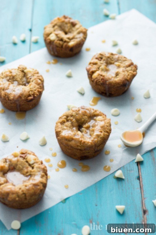 Guilt-Free Fall Indulgence: White Chocolate Pumpkin Cookie Cups 2 Gluten-Free White Chocolate Pumpkin Cookie Cups with Apple Cider Caramel - a decadent fall dessert recipe from The Messy Baker Blog