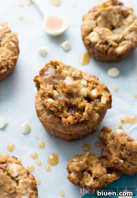 Guilt-Free Fall Indulgence: White Chocolate Pumpkin Cookie Cups 6 Gluten-Free White Chocolate Pumpkin Cookie Cups with Apple Cider Caramel drizzle, ready to be served for a special occasion.