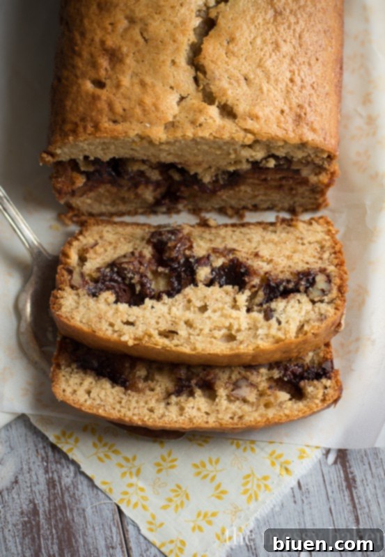 Nutella & Toasted Pecan Swirl Banana Bread | www.themessybakerblog.com