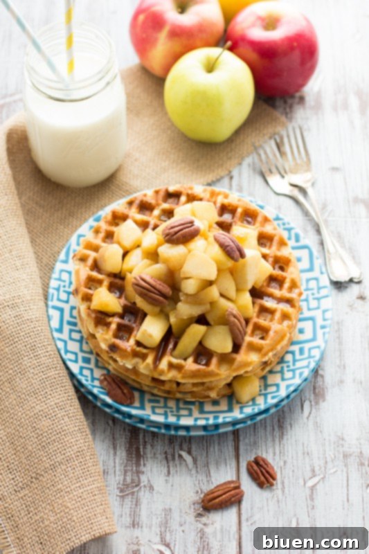 Gluten-Free Cinnamon Chip Waffles with Caramelized Apples, drizzled with caramel sauce