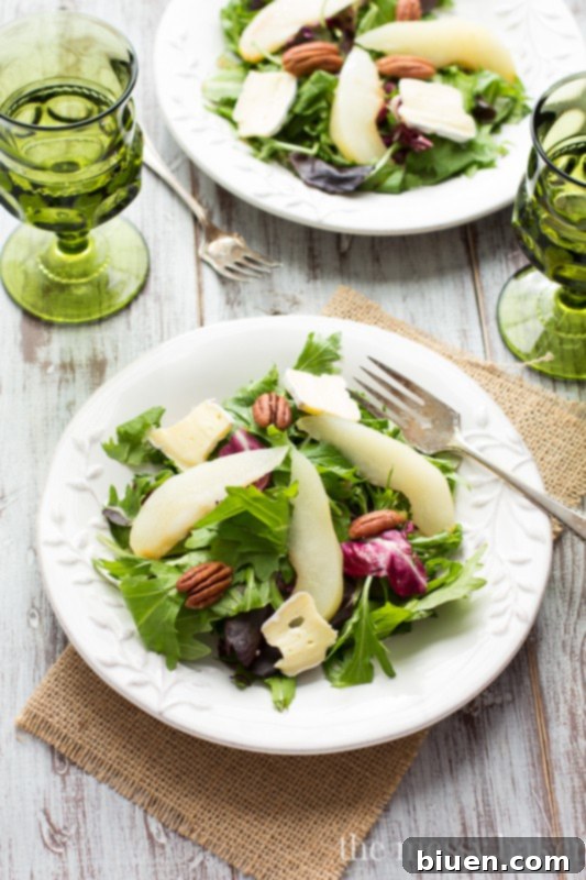 Poached Pear and Brie Salad with Balsamic Vinaigrette | www.themessybakerblog.com