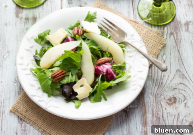 Poached Pear and Brie Salad with Balsamic Vinaigrette | www.themessybakerblog.com