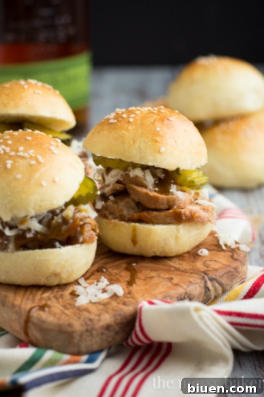 Delicious Cuban Pork Sliders with Mustard Bourbon Glaze, perfect for entertaining and game day appetizers. www.themessybakerblog.com