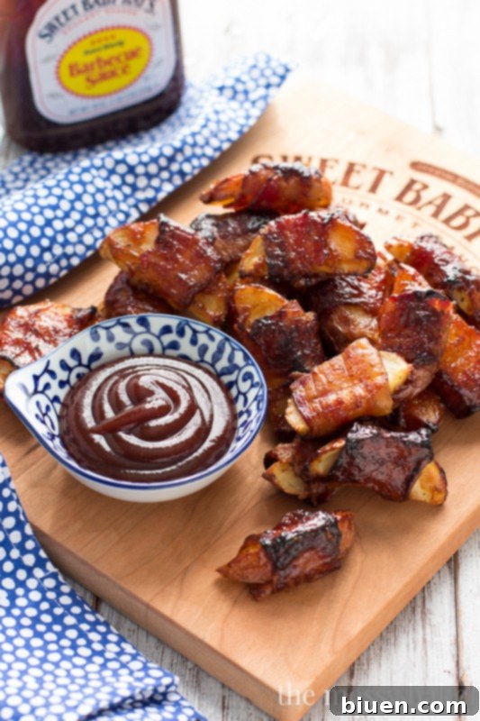 Bacon Blanket BBQ Wedges 2 These crispy potato wedges wrapped in smoky bacon and glazed with barbecue sauce make the perfect appetizer for football, the holidays, and parties. | www.themessybakerblog.com