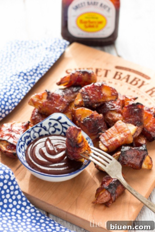 Bacon Blanket BBQ Wedges 3 These crispy potato wedges wrapped in smoky bacon and glazed with barbecue sauce make the perfect appetizer for football, the holidays, and parties. | www.themessybakerblog.com