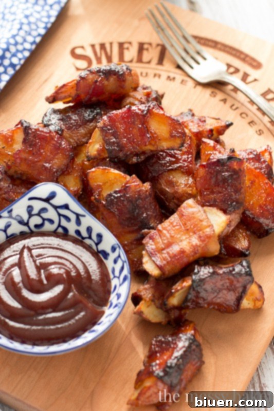 Bacon Blanket BBQ Wedges 8 These crispy potato wedges wrapped in smoky bacon and glazed with barbecue sauce make the perfect appetizer for football, the holidays, and parties. | www.themessybakerblog.com