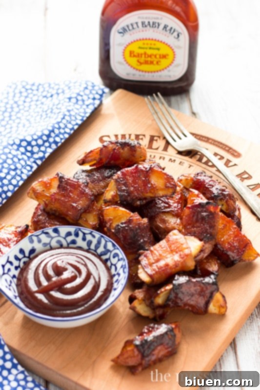 Bacon Blanket BBQ Wedges 10 These crispy potato wedges wrapped in smoky bacon and glazed with barbecue sauce make the perfect appetizer for football, the holidays, and parties. | www.themessybakerblog.com