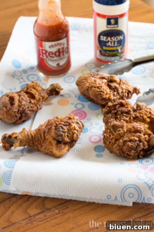 Buttermilk Fried Chicken process: Soaking chicken in tangy buttermilk before frying