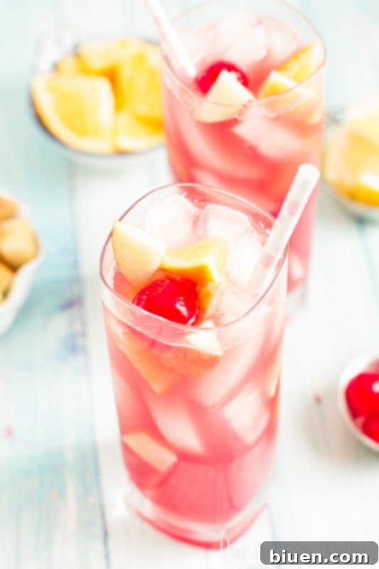 Irresistible Black Cherry Sangria 3 Close up of Black Cherry Sangria with fresh fruit garnishes