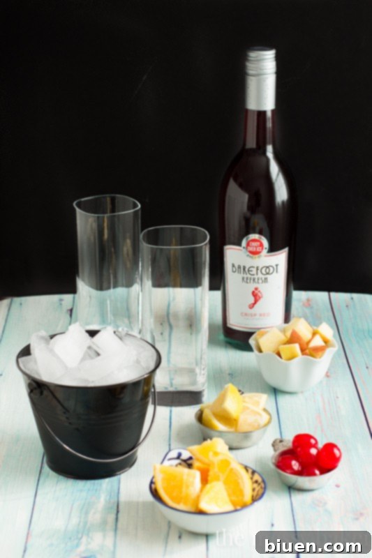 Irresistible Black Cherry Sangria 4 Black Cherry Sangria chilling in a glass pitcher with fruit