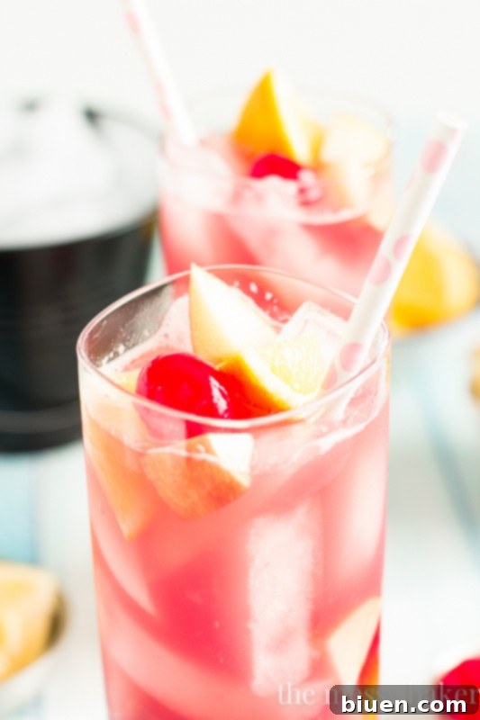 Irresistible Black Cherry Sangria 6 Close up of vibrant Black Cherry Sangria with ice and fruit