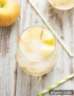 Fizzy Caramel Apple Sangria 10 Finished Sparkling Caramel Apple Sangria in a glass