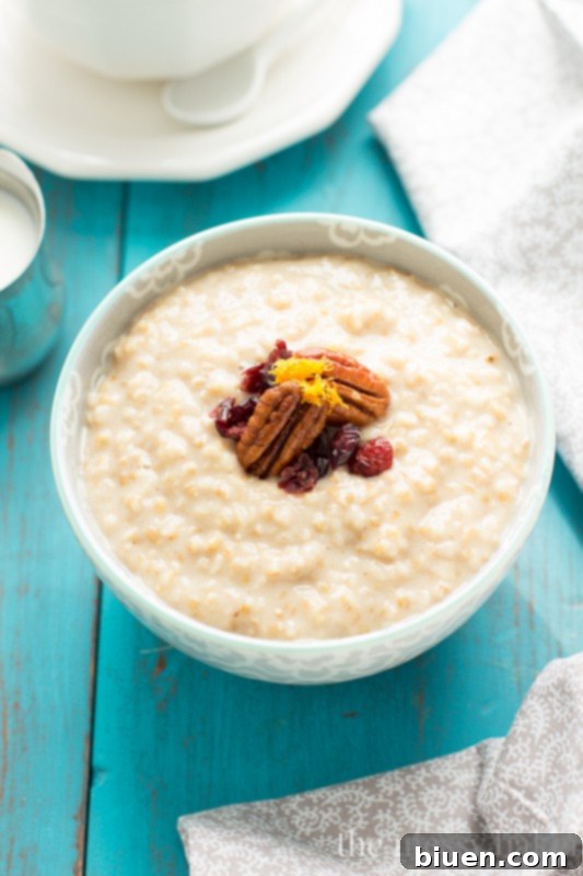 Close-up shot of cooked steel cut oats, showcasing their wholesome texture