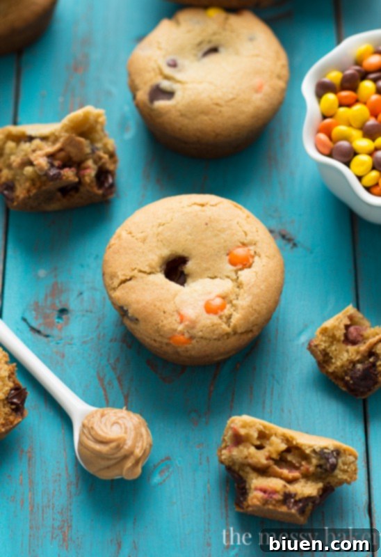 Chocolate Chip Cookie Cups with Peanut Butter Surprise 33 Peanut Butter Stuffed Chocolate Chip Cookie Cups | www.themessybakerblog.com