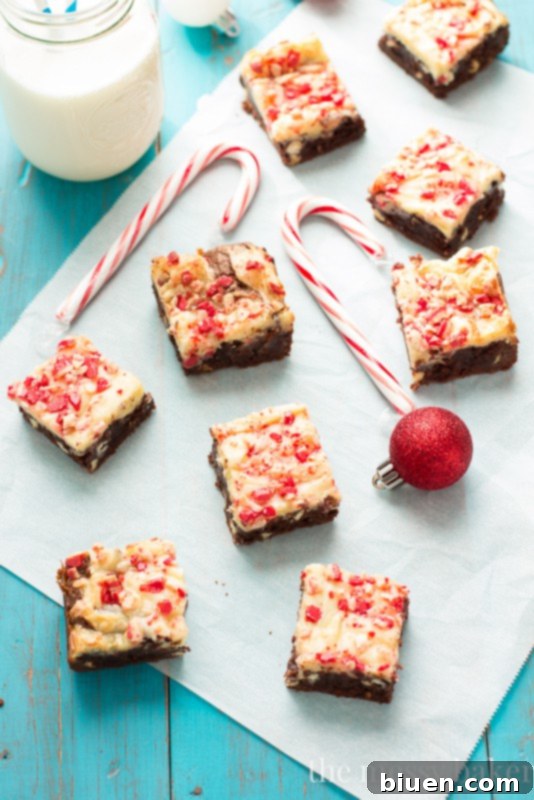 A full batch of Peppermint Cheesecake Swirl Brownies, ready to be served at a holiday gathering