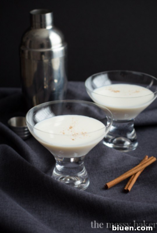 Warm Caramel Spice Martini 39 Closeup of a Caramel Cinnamon Martini with RumChata and Caramel Vodka, garnished with cinnamon stick