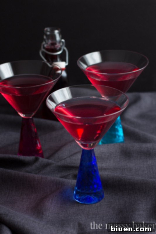 Mixed Berry Martini ingredients and fresh berries