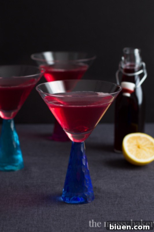 Mixed Berry Martini in a blue crystal glass