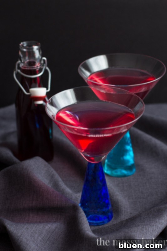 Mixed Berry Martini garnished with fresh berries