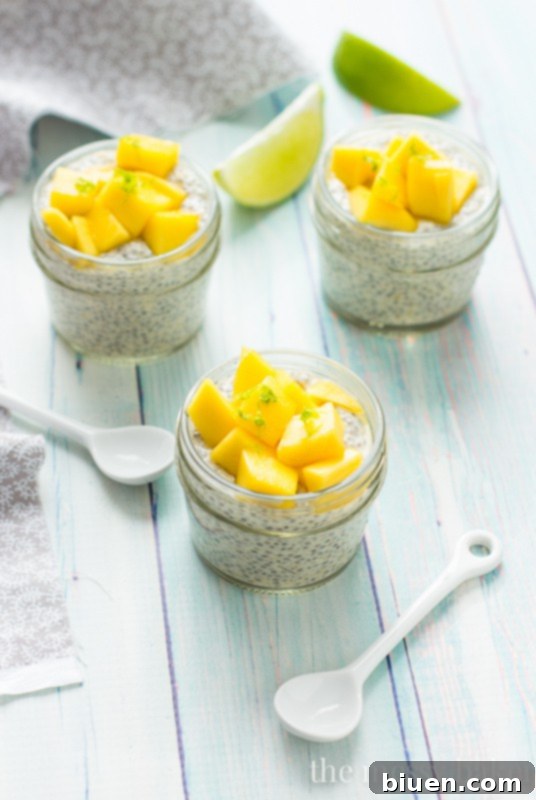 Mango Chia Seed Pudding with a spoon, ready to eat