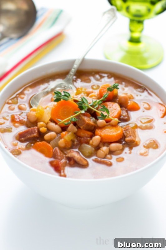 Slow Cooker Navy Bean Soup with Ham served in a bowl