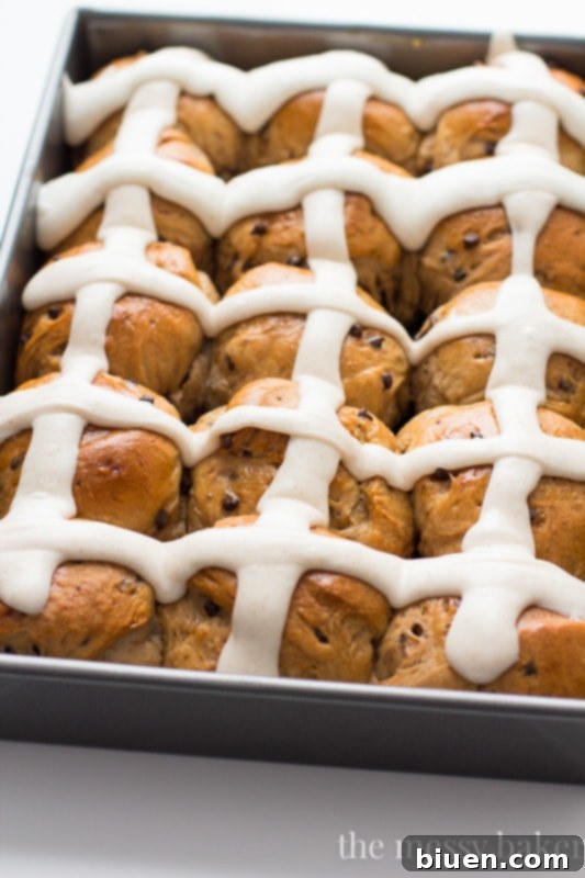 Irresistible Chocolate Chip Hot Cross Buns 23 Closeup of fluffy Chocolate Chip Hot Cross Buns