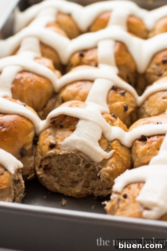 Freshly baked Chocolate Chip Hot Cross Buns cooling