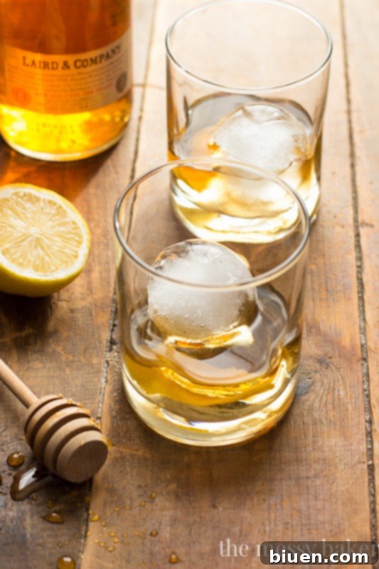 Honey Jack Cocktail: A refreshing mixture of AppleJack liquor, fresh lemon juice, and honey