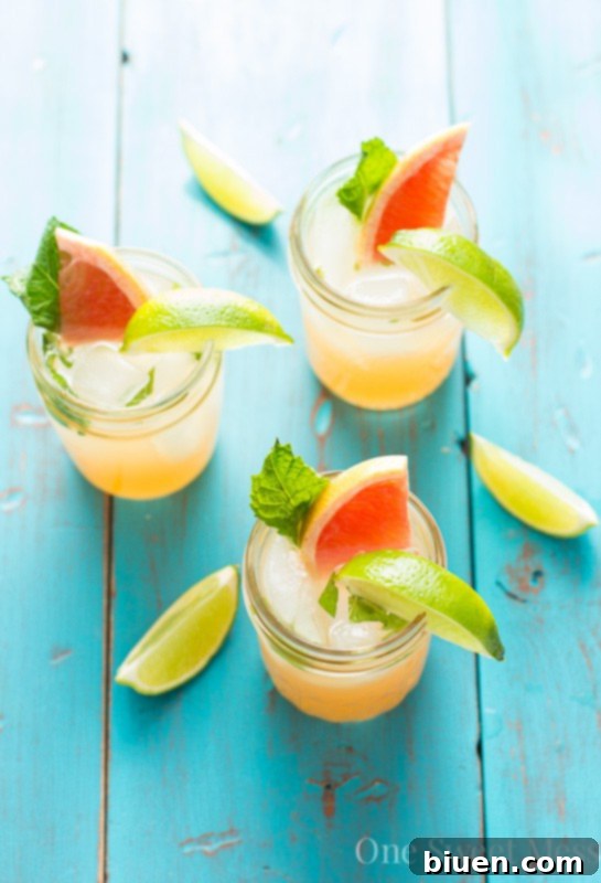 Grapefruit Honey Mojito ingredients being prepared in a shaker.