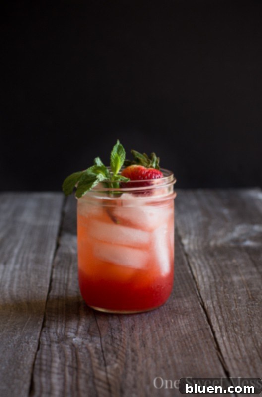 Strawberry Jam Bourbon Smash - a sweet and spirited cocktail.