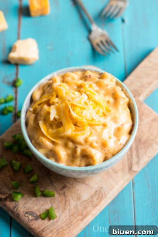 Smoky Chipotle Beer Mac and Cheese 8 Chipotle Beer Mac & Cheese being served from a baking dish