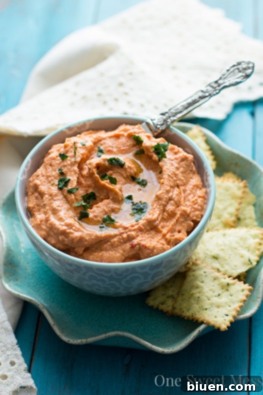 Sun-Dried Tomato & Roasted Red Pepper Hummus with fresh vegetable dippers.