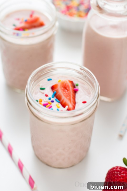 Strawberry Banana Cake Batter Dream 32 Strawberry-Banana Cake Batter Smoothie garnished with colorful sprinkles