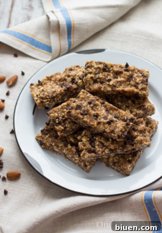 Chocolate Chip Cookie Energy Bars stacked on a plate