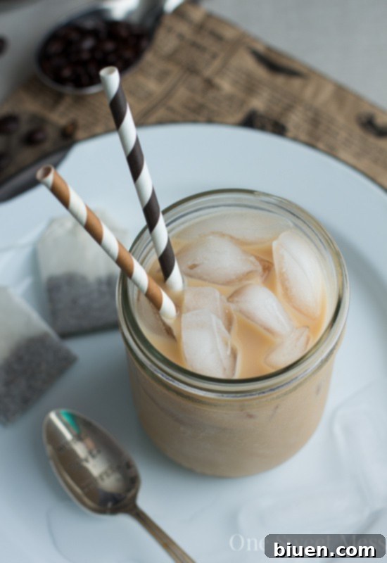 Hand adjusting the strength dial on an iCoffee Opus Brewer