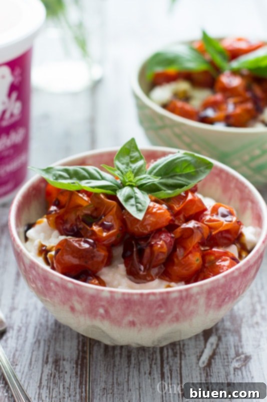 Overhead shot of two Roasted Tomato Basil Cottage Cheese Bowls, perfectly plated and ready to eat, showing the generous toppings.